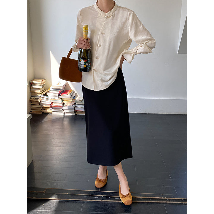 Damer elegant bluse med knapdetaljer og ekstravagant krave Stilla