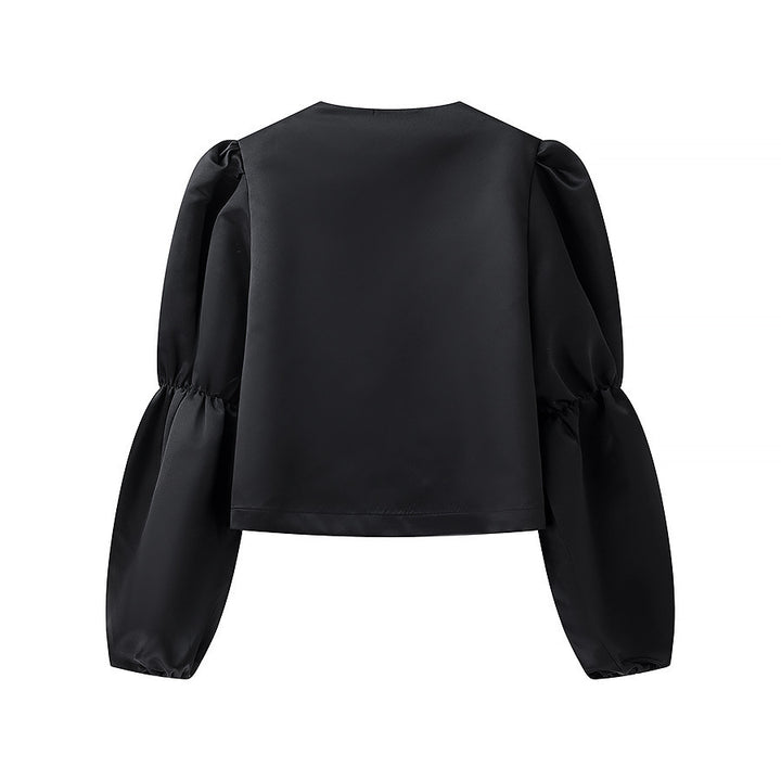 Kvindernes elegant skræddersyede blouse med voluminøse ærmer Stilla