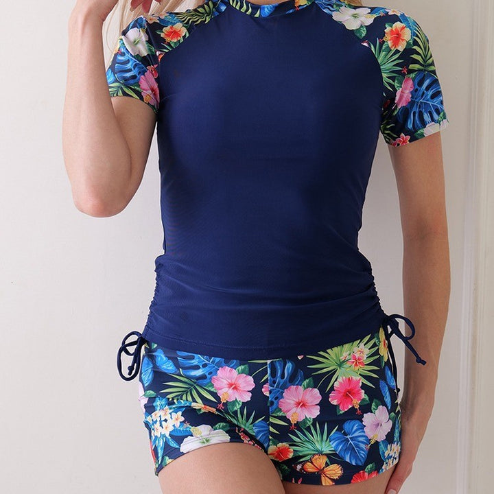 Dame Sporty badetøj med floral mønsterdetalje og figursyet snit Stilla