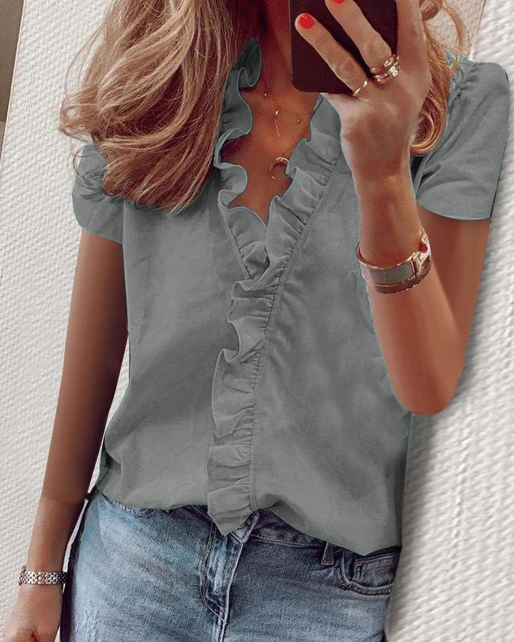 Kvindernes elegante bluse med ruffle detaljer Stilla