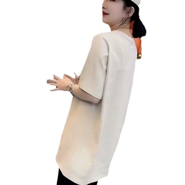 Dame T-shirt med glitrende stjernemotiv og afslappet oversized-snit Stilla