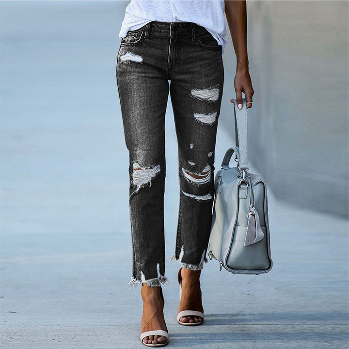 Dame Ripped High-Waist Jeans med frynset kant og modeødelæggede detaljer Stilla