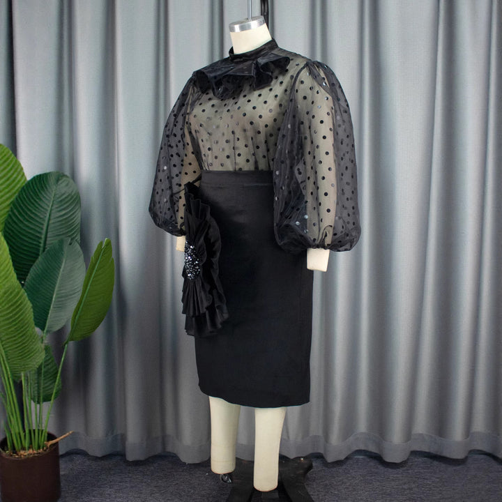 Dame Elegant kjole med transparente pufærmer og ruchesaccent Skovae