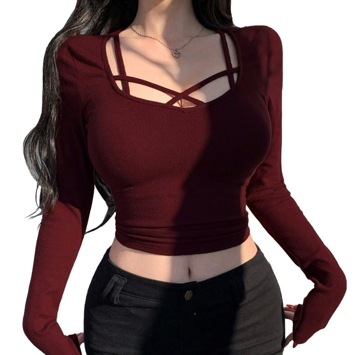 Kvindernes langærmede crop top med elegant snit og dekorativ knude Stilla