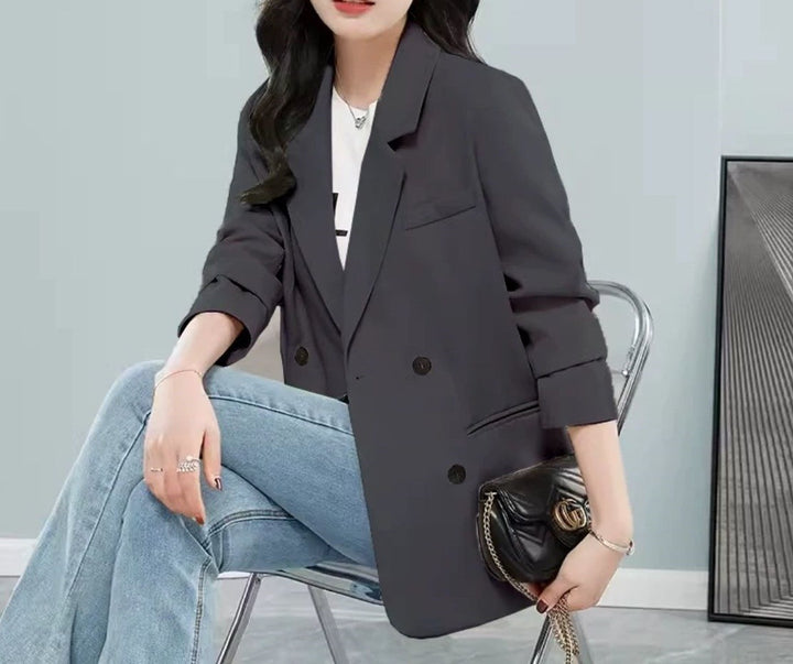 Kvinders stilfulde oversized blazer med dobbelt knapfane og stilfulde detaljer Stilla
