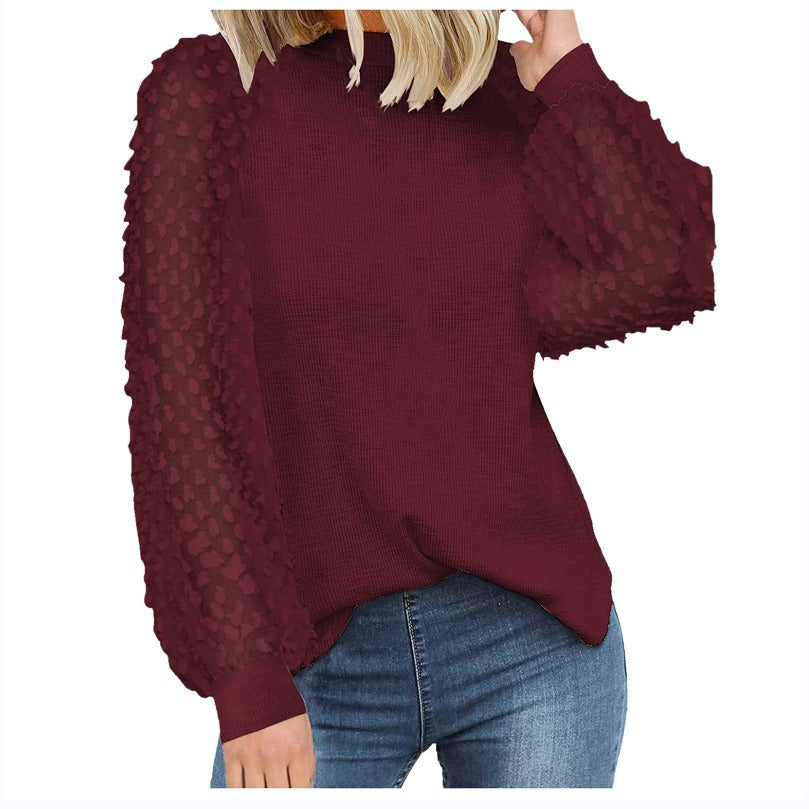 Dame strikpullover med transparente pufærmer Stilla