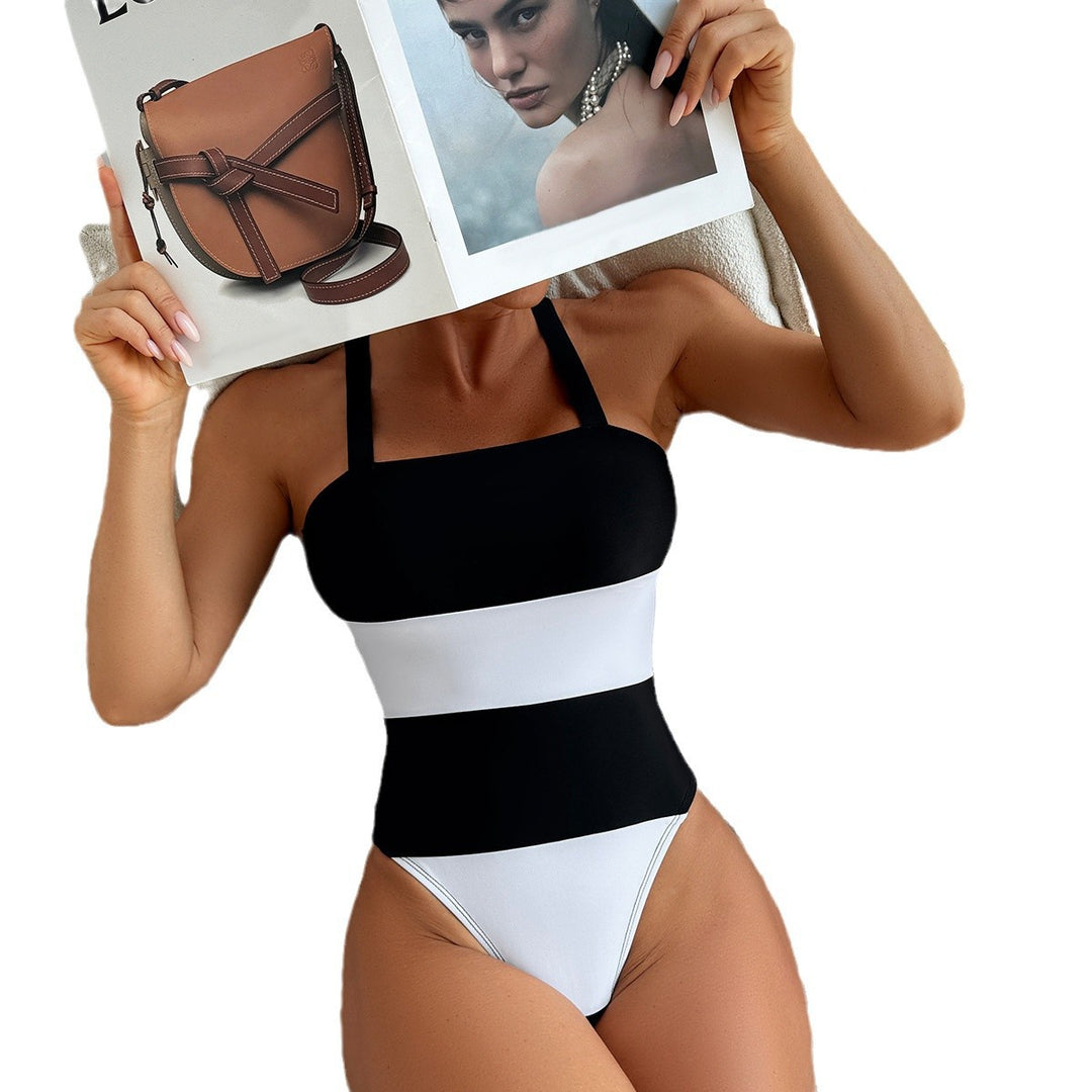 Dame one-piece svømmebadedragt med moderne blokstribet look Skovae