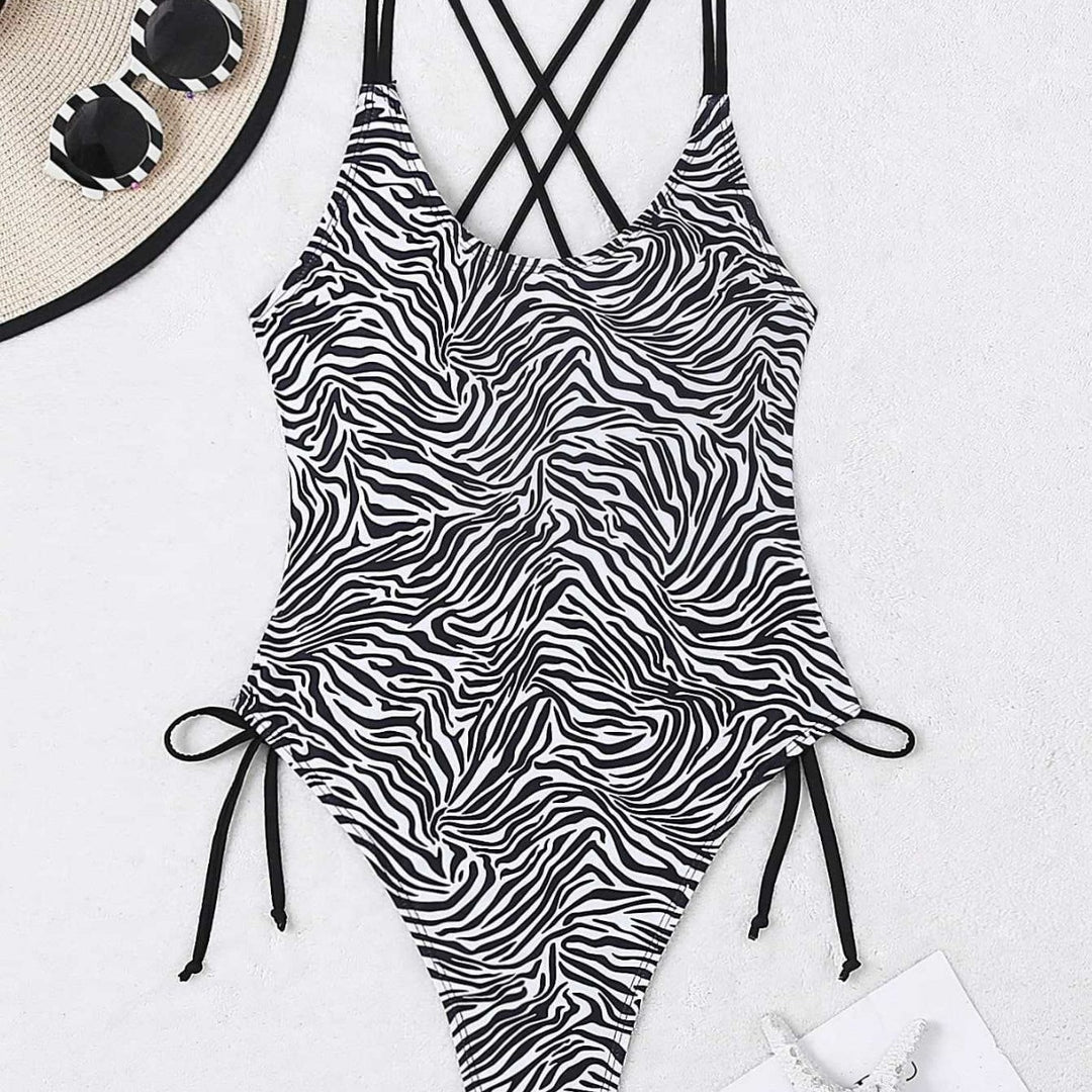 Dame one-piece badedragt med spændende zebra-design og høj benudskæring Skovae