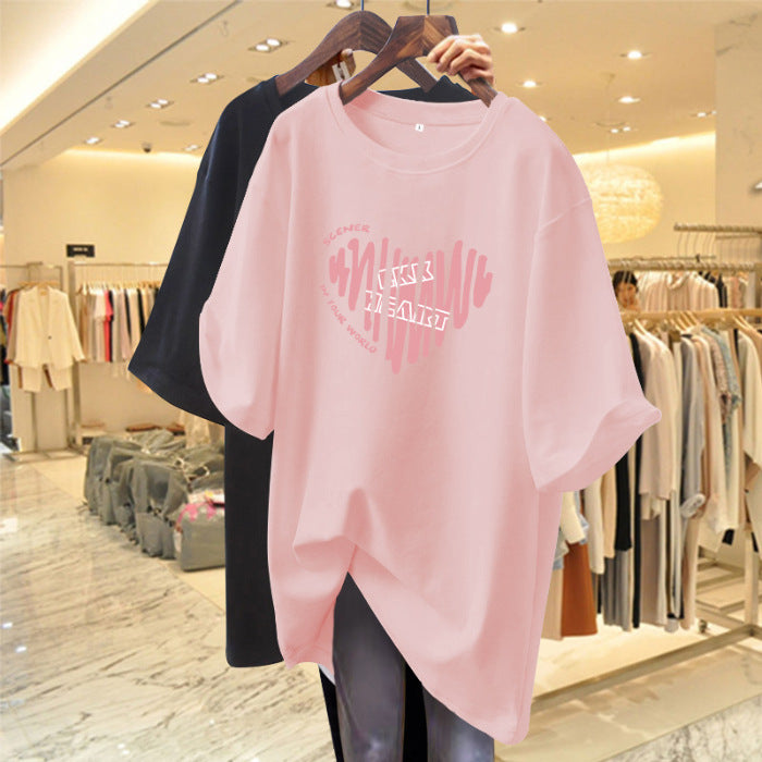 Dame Oversized T-shirt med kreativt hjerte motiv og moderne skrift Stilla