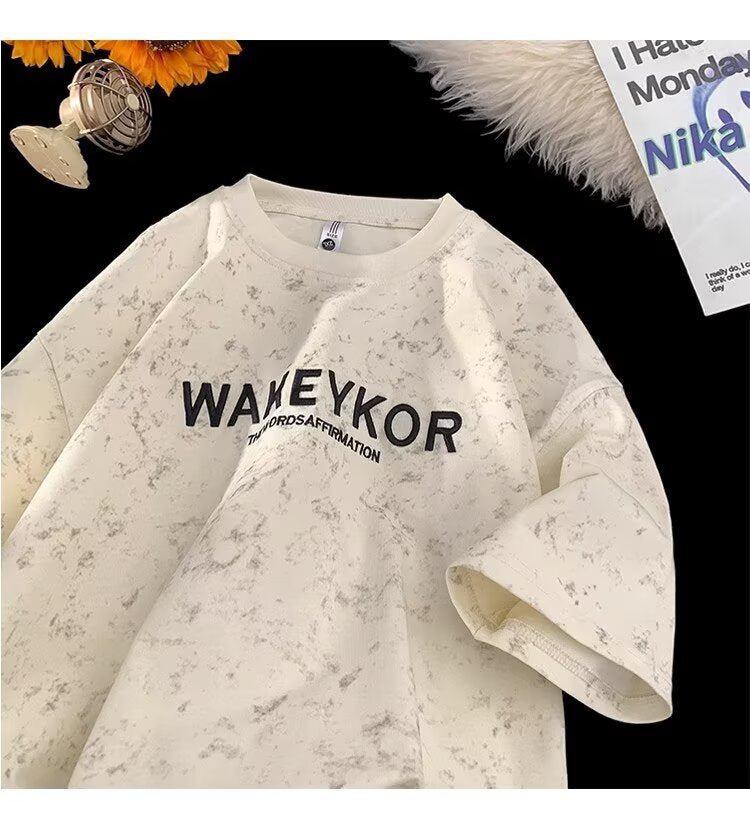 Dame Oversized T-shirt med kreativ tekst og unikt design Stilla