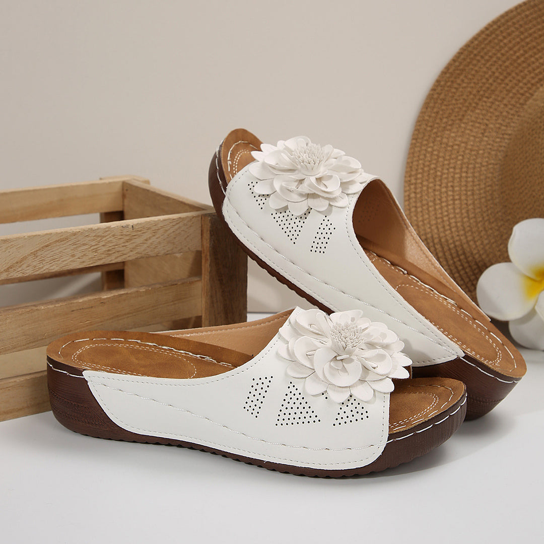 Dame Clogsandaler med dekorative blomsterapplikationer og komfortabel sål Stilla