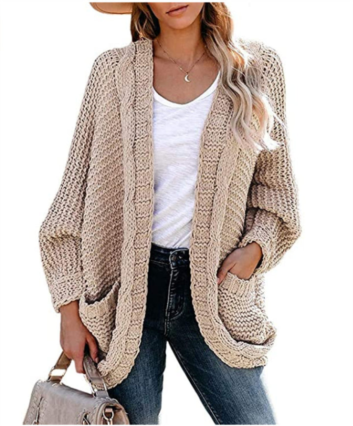 Kvinders chunky strikket cardigan med afslappede lommer og voluminøse ærmer Stilla