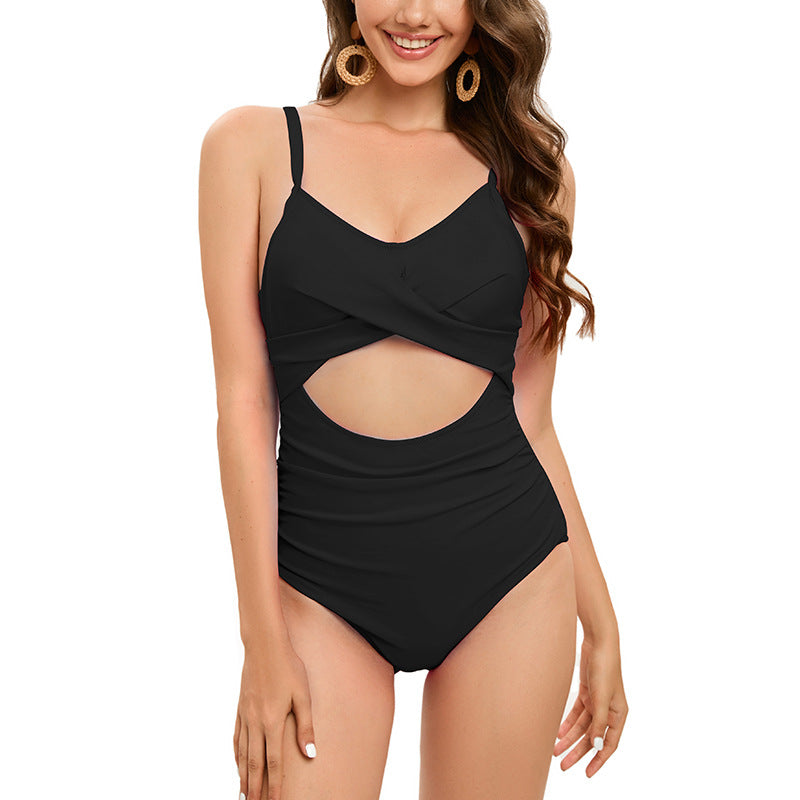 Dame one-piece badedragt med rynker og moderne cut-out-detaljer Stilla