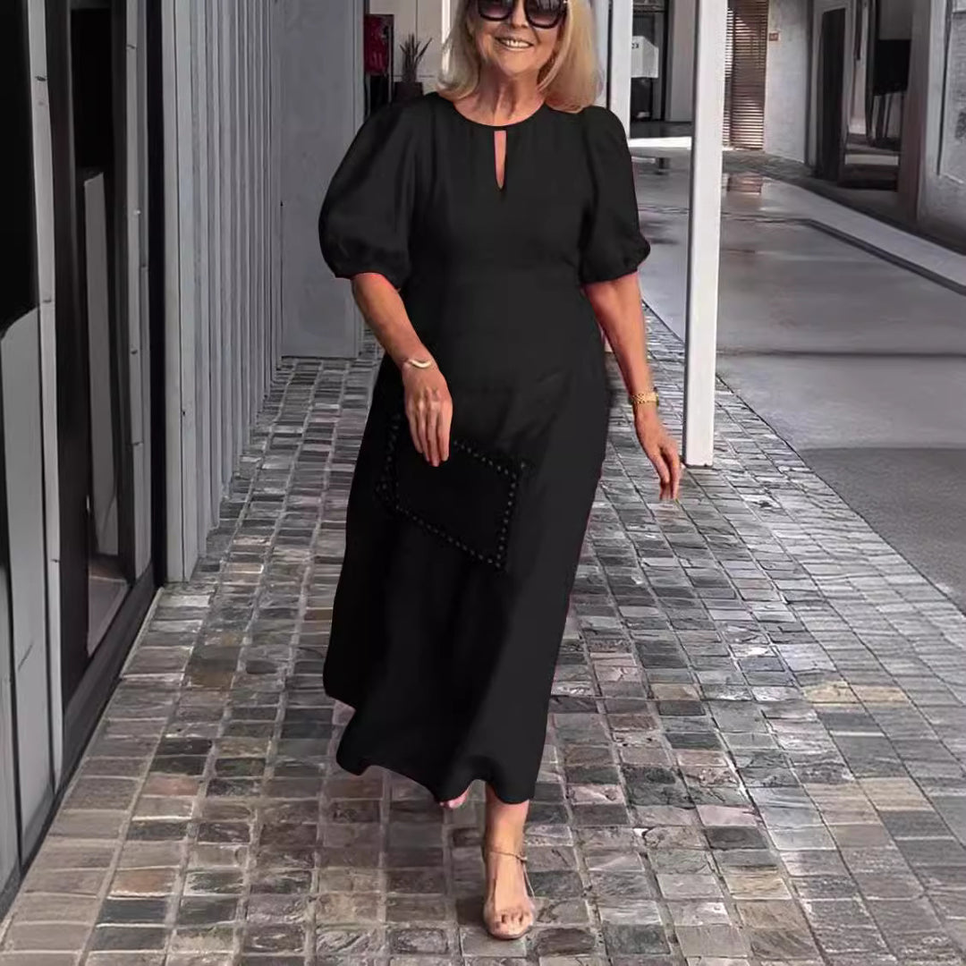 Dame elegant, løs maxikjole med puffærmer og smart udskæring Stiila