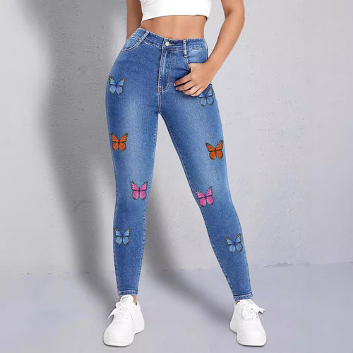 Dame Skinny Jeans med farverige sommerfugleapplikationer Stilla