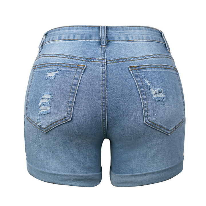 Dame mode denim-shorts med stilige riv detaljer og opfoldet kant Stilla