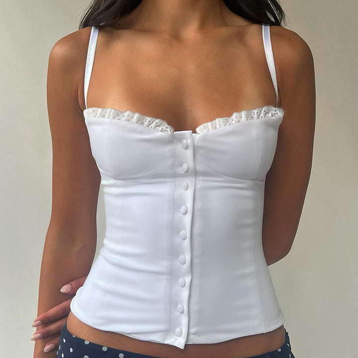 Damebluse med spidsbroderi og dekorative knapdetaljer Skovae
