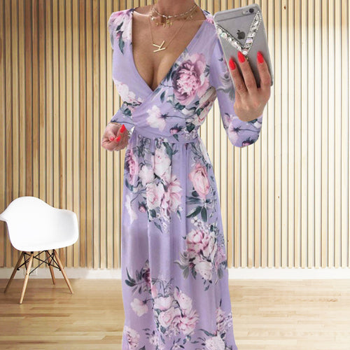 Damer blomst design maxikjole med dyb slids og elegant indpakningslook Stilla