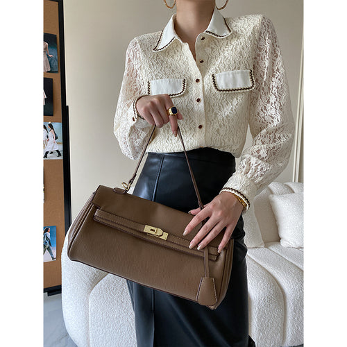 Kvindernes elegante bluse i blonder med kontrastdetaljer Stilla