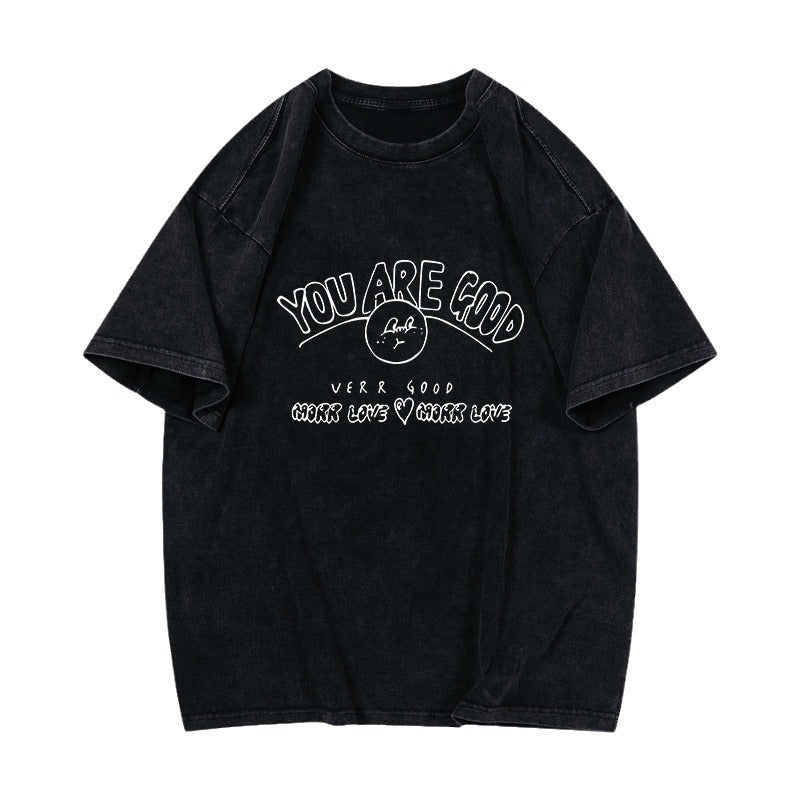 Dame T-shirt med afslappet pasform og positivt statementtryk Stilla