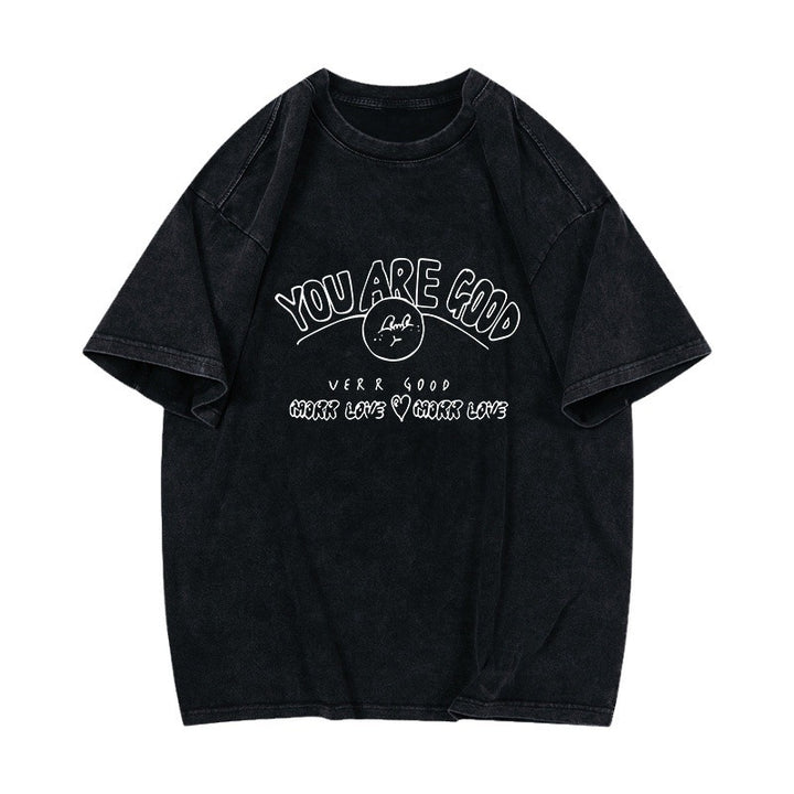 Dame T-shirt med afslappet pasform og positivt statementtryk Stilla