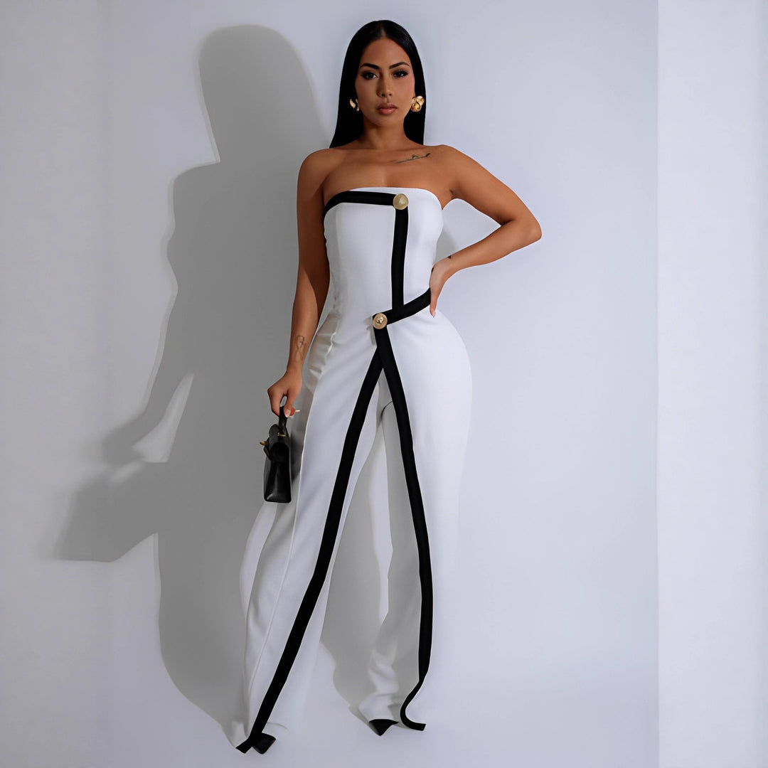 Dame-jumpsuit med elegant bustier-overdel og kontrasterende kantdetaljer Skovae