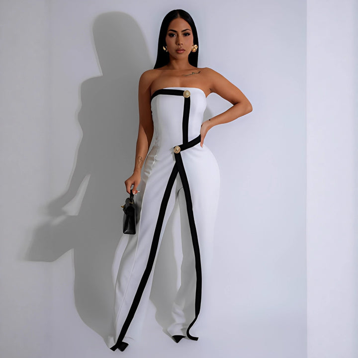 Dame-jumpsuit med elegant bustier-overdel og kontrasterende kantdetaljer Skovae