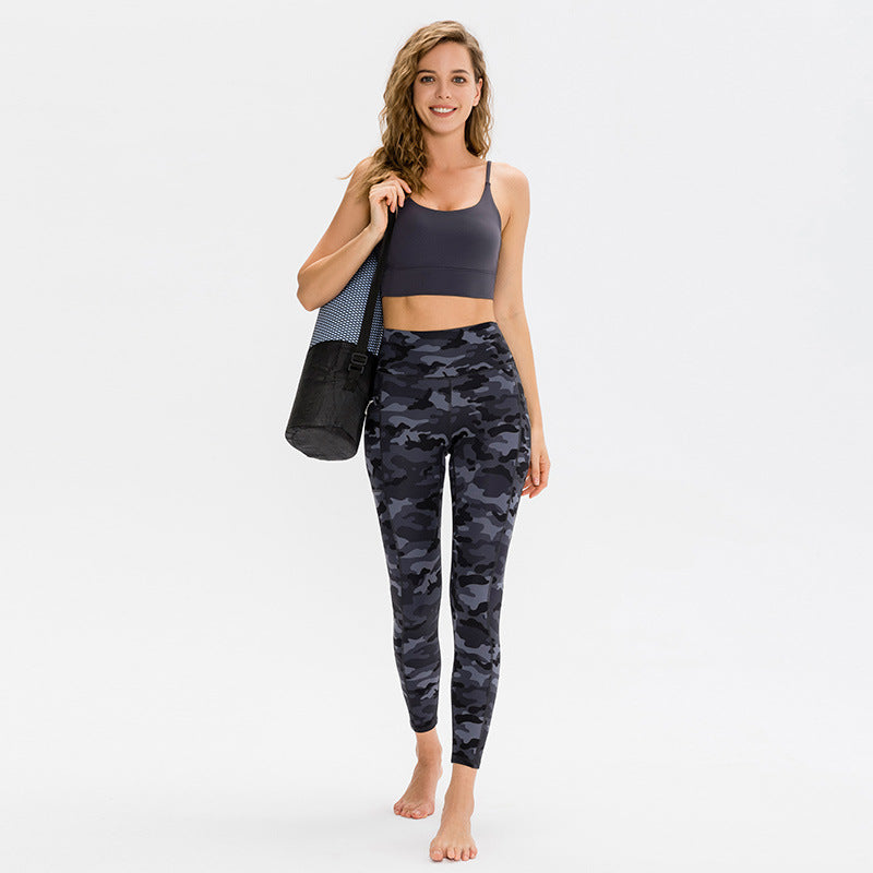 Dame Kvalitets Performance-Leggings med praktiske sidelommer og elastisk talje Stilla