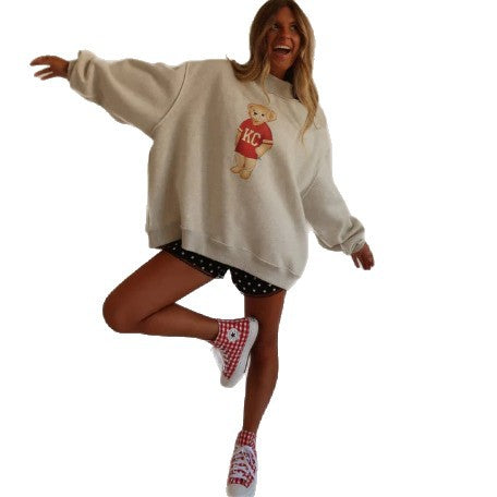 Damers oversized sweatshirt med et sødt bjørnemotiv Stilla