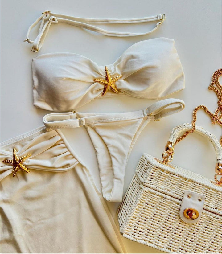 Dame bikini-sæt med glitrende detaljer og elegant nederdel Stilla