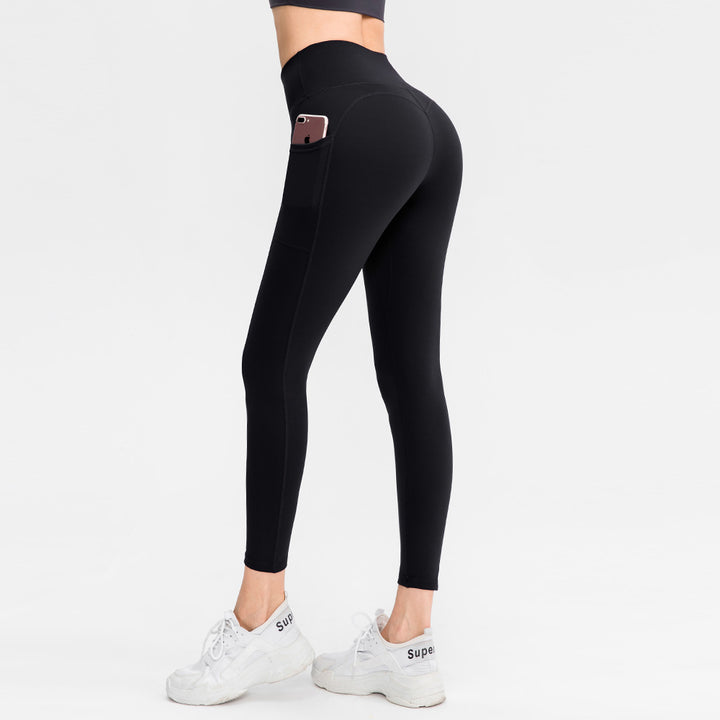 Dame højt skårne fitness leggings med praktiske sidelommer og fleksibelt materiale Stilla
