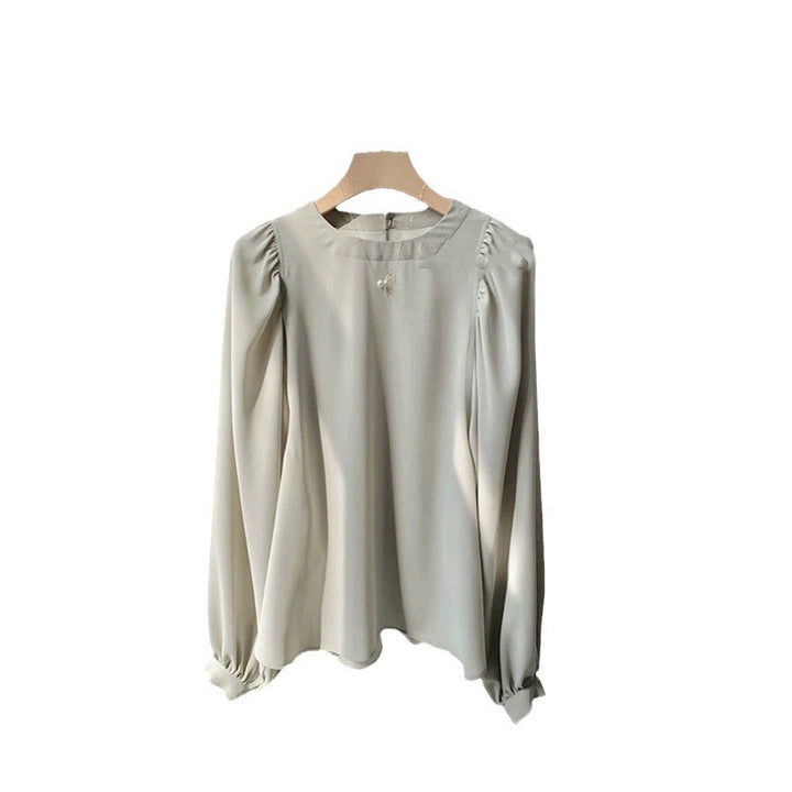 Damer elegant bluse med afslappede pufærmer og fint stof Stilla