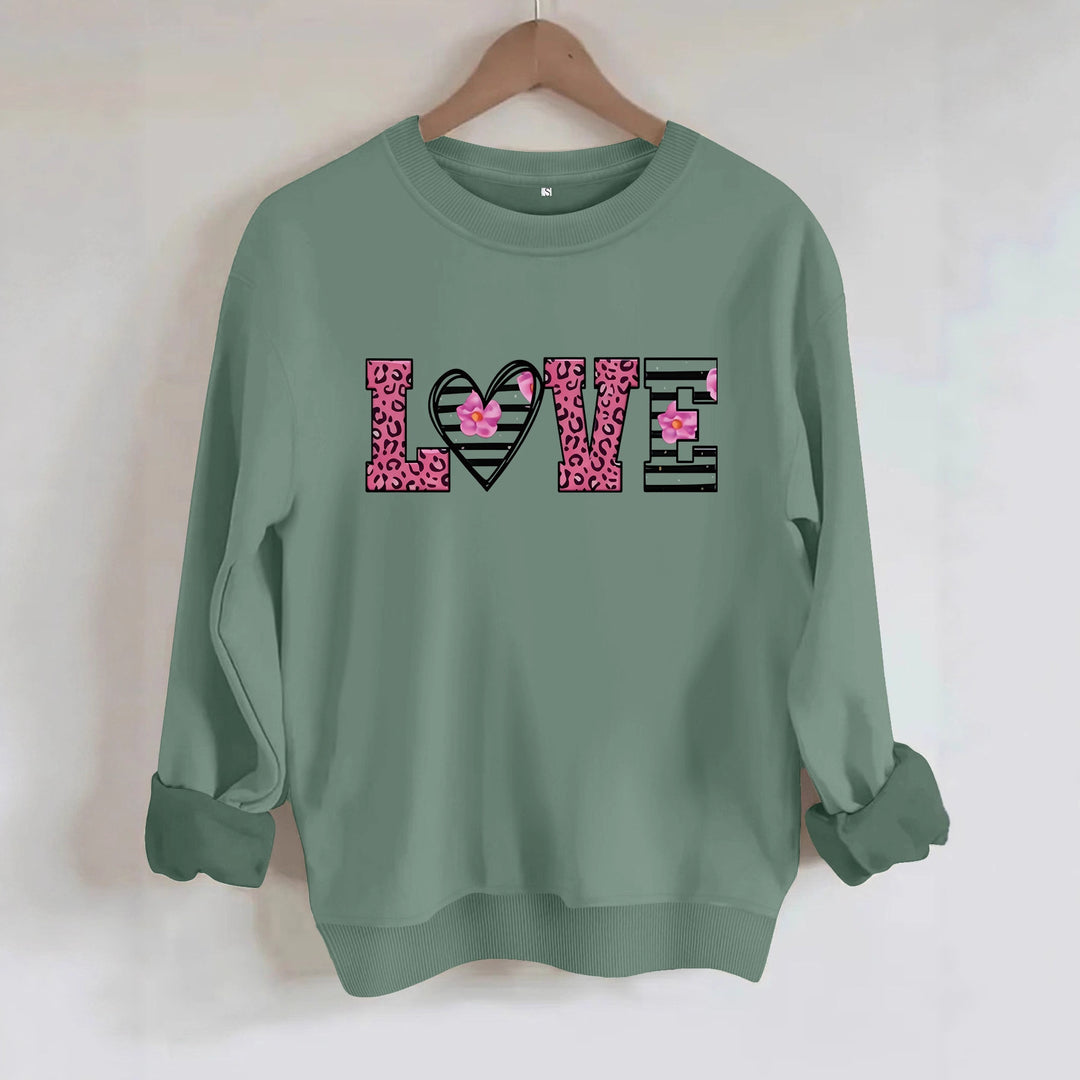 Kvinders sweatshirt med moderne leopard hjerte design og behagelig pasform Stilla