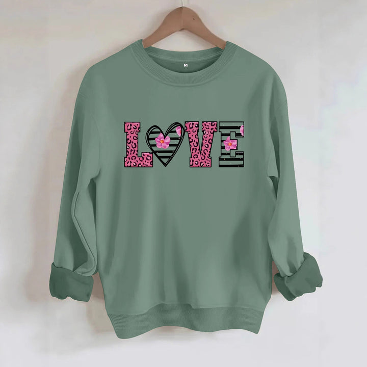 Kvinders sweatshirt med moderne leopard hjerte design og behagelig pasform Stilla