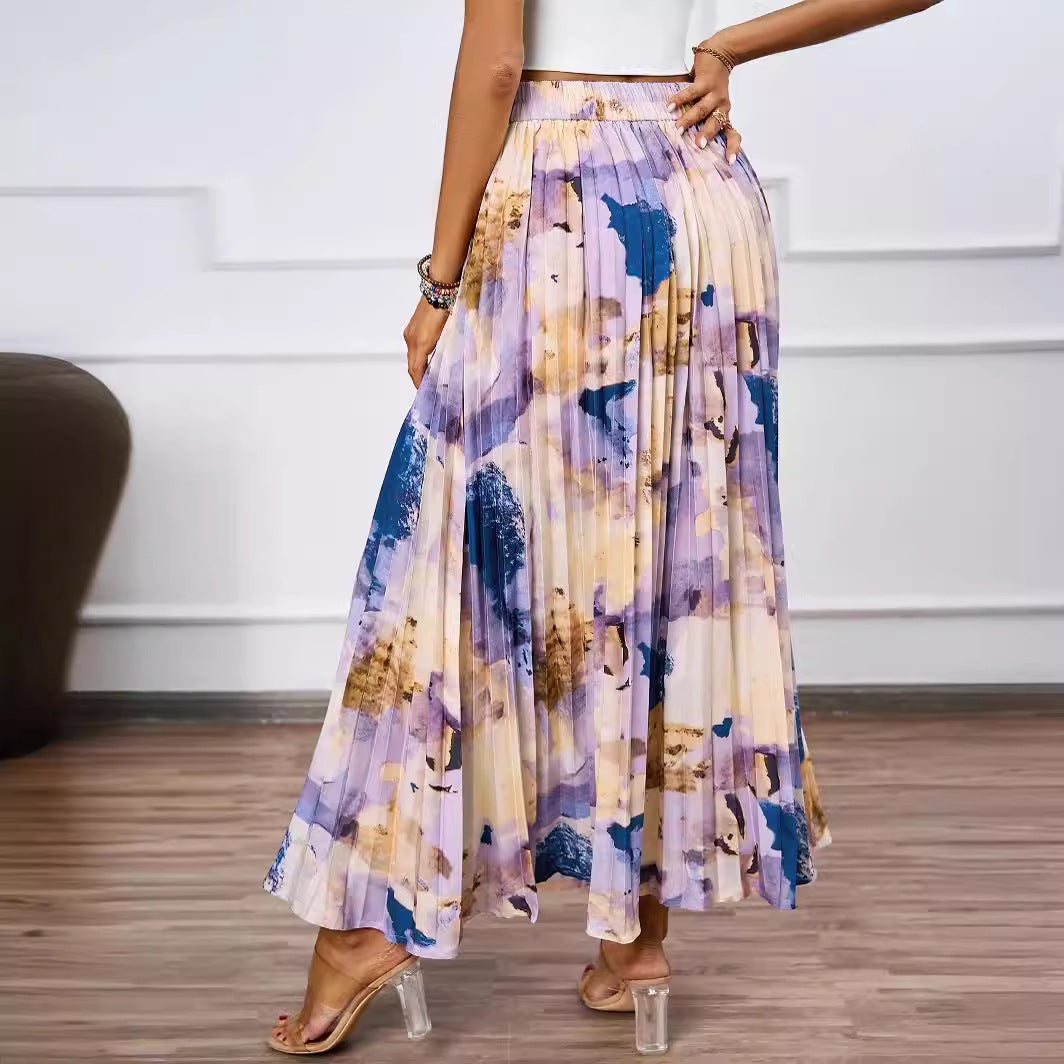 Dame maxi nederdel med plisserede detaljer og blomsterdesign Stilla