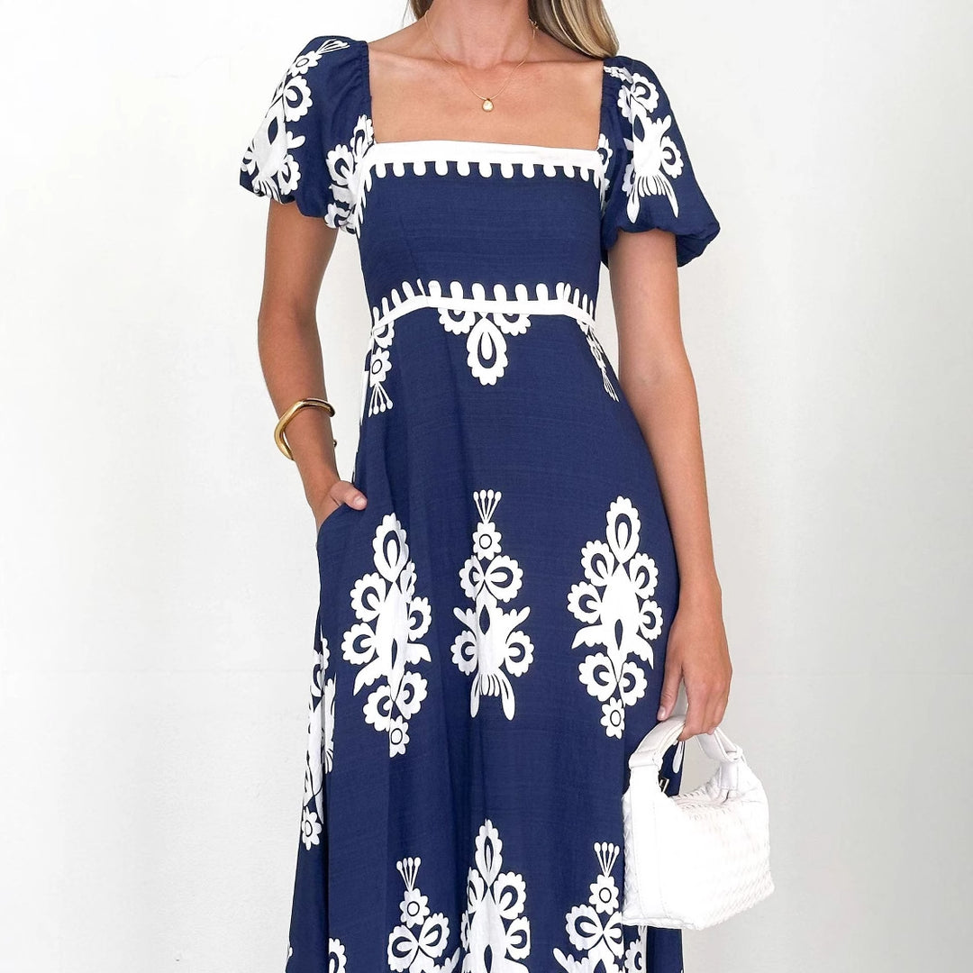 Dame maxi kjoler med elegante flæse detaljer og blomster mønster Skovae