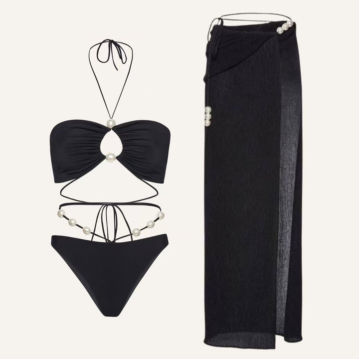 Dame bikini-sæt med modedetalje af perler og elegant nederdel Stilla