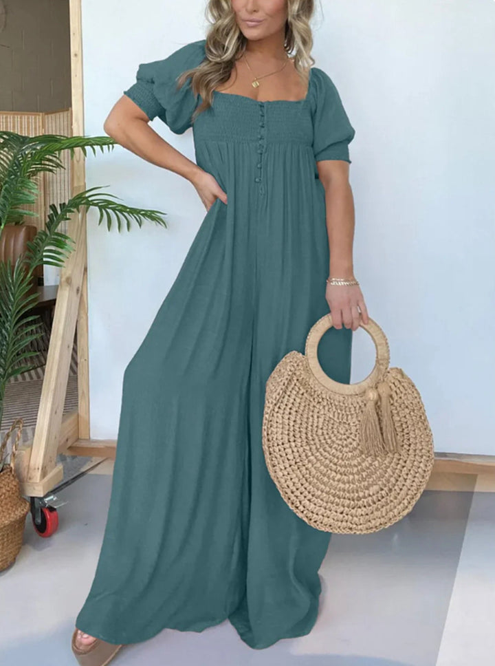 Dame afslappet jumpsuit med smalle stropper og knapdetalje Stilla