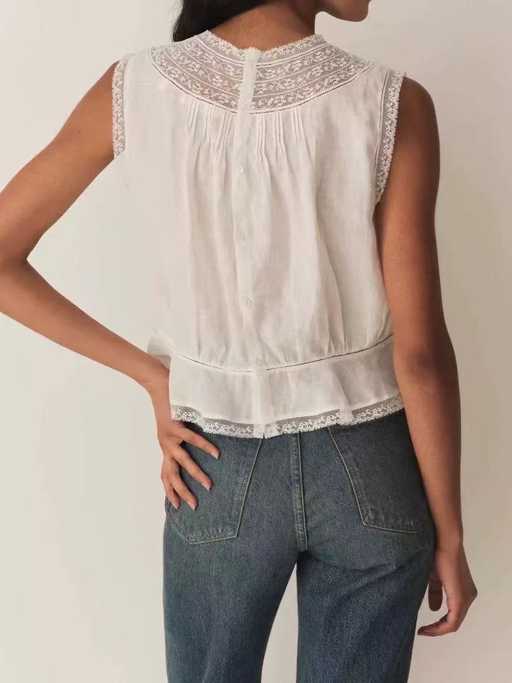 Damebluse med fine spidsdetaljer og let A-formet snit Stilla
