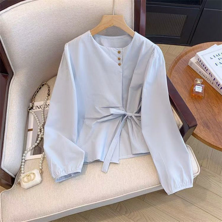 Damebluse med elegant sløjfe Stilla