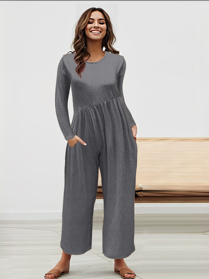 Dame mode jumpsuit med glitrende overdel og vidt skåret ben Stilla