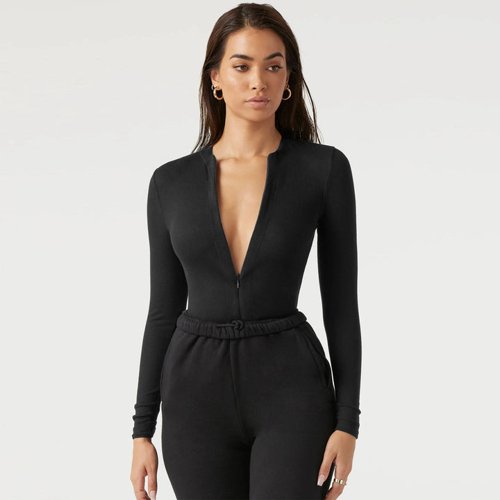 Dame bodysuit med dyb V-hals og langærmet Stilla