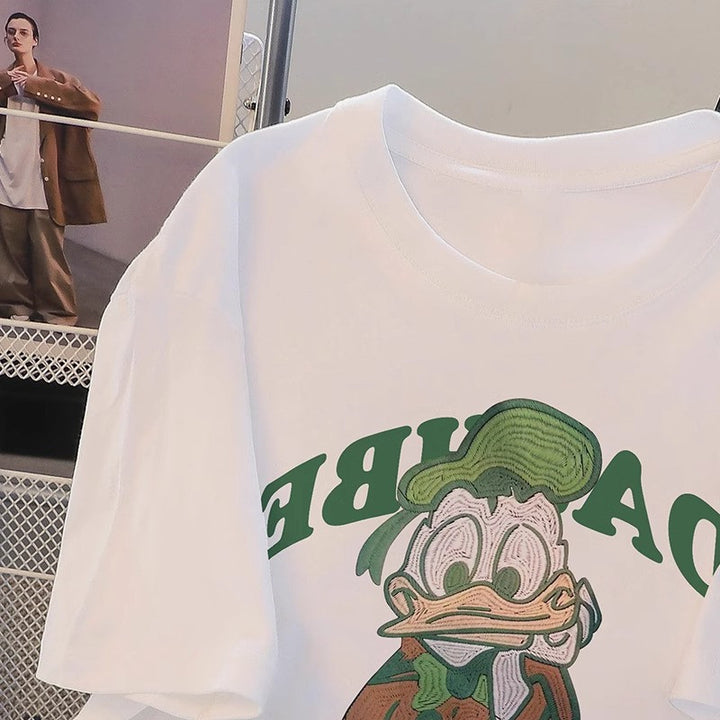 Dame T-shirt med kreativt Donald Duck motiv og afslappet snit Stilla