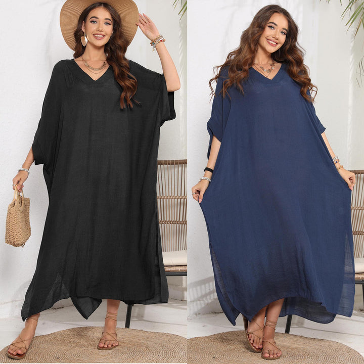 Dame Kaftan i afslappet oversized stil med dyb V-udskæring og sidelæg Stilla