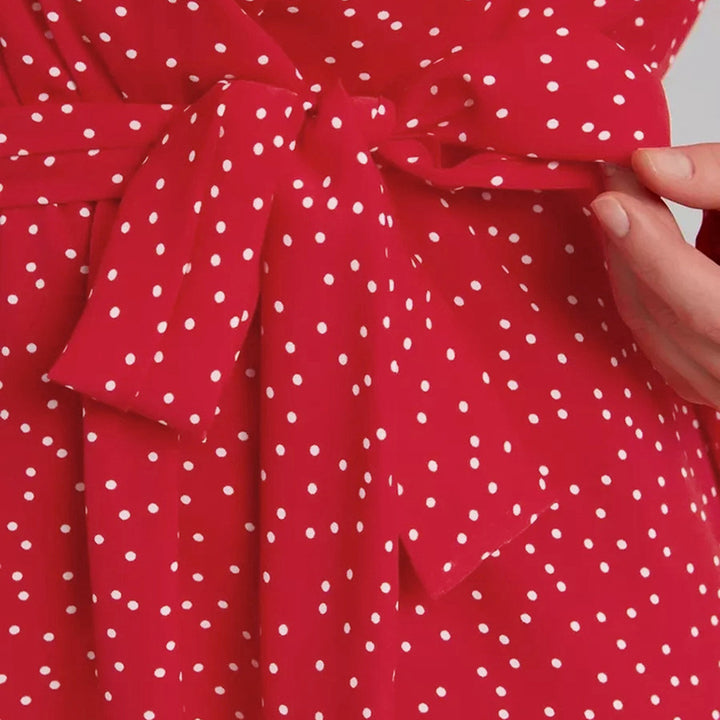 Dame vendekjole med elegante pufærmer og let V-udskæring Stilla