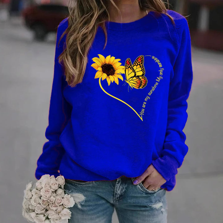 Kvinders sweatshirt med grafisk sommerfugl og solskinsmotiv Stilla