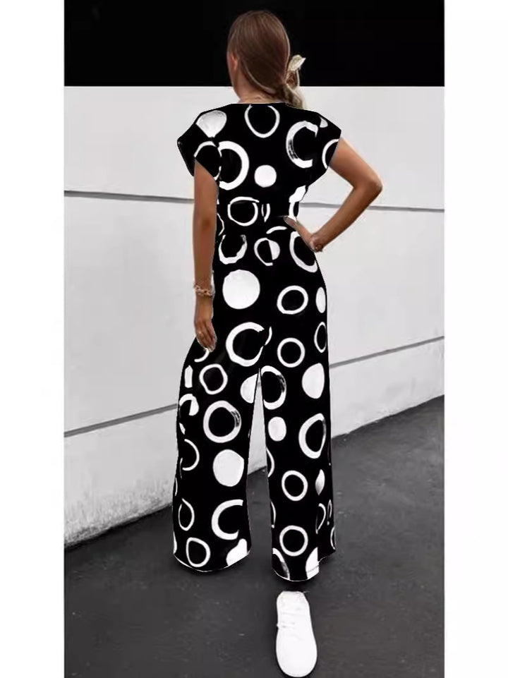 Dame Elegant Jumpsuit med iøjnefaldende mønster og smart bælte Stiila