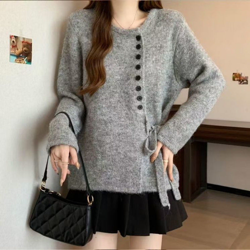 Kvinders stilfulde cardigan med fashionable knapdetaljer og bælte Stilla