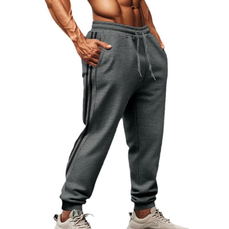 Herre Sporty Joggingbukser med elastisk talje og stilfulde side striber Stilla