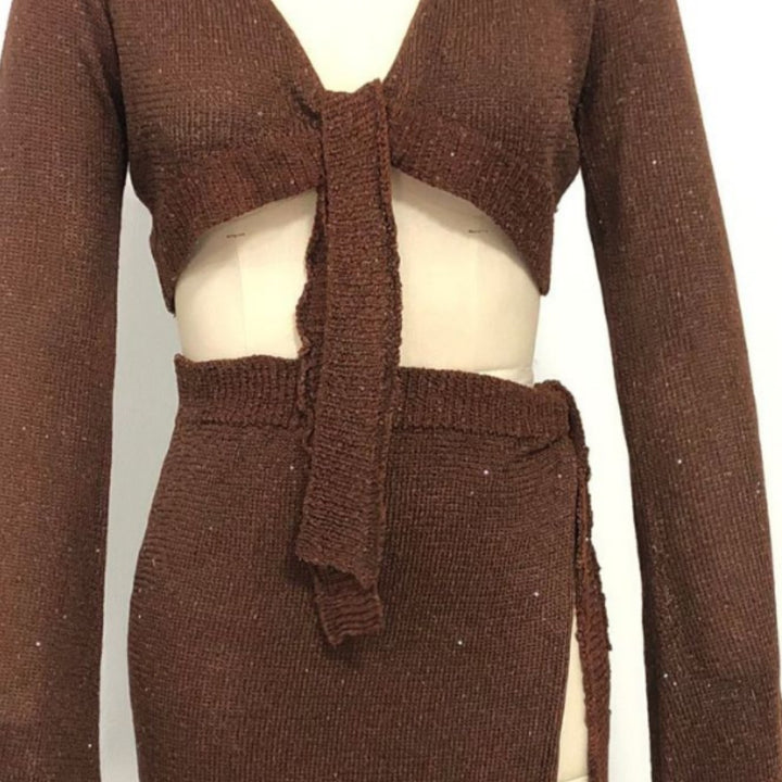 Dame to-delt strikensemble med raffineret snit Skovae